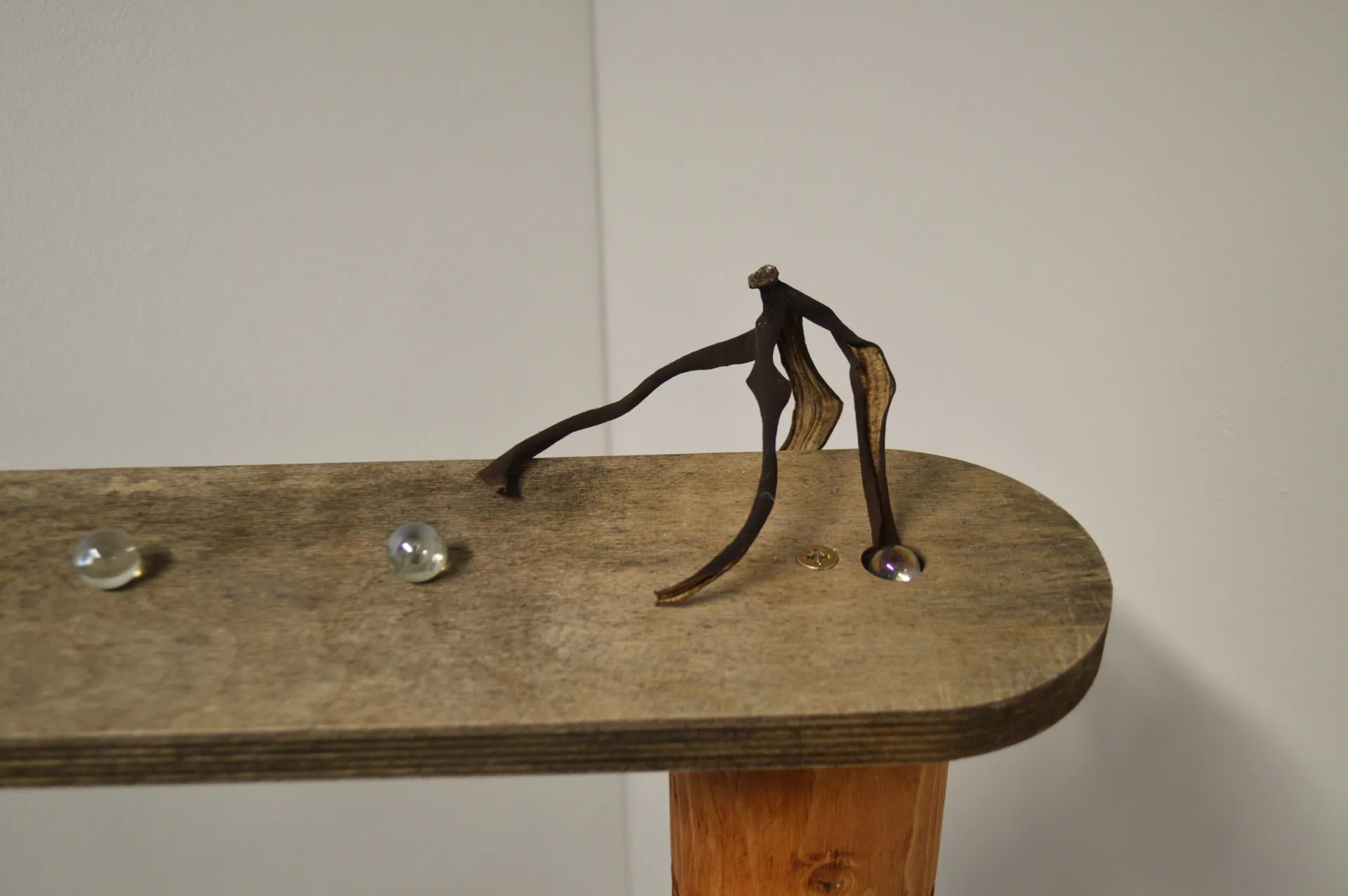 Wooden table, Marbles, Banana skin